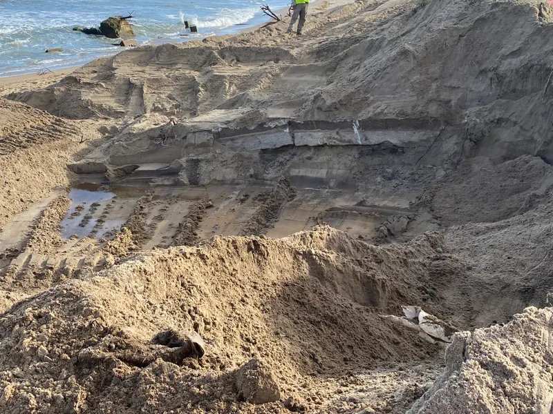 Late afternoon light over Buxton Beach on Hatteras Island with wide sandy beach and gentle ocean waves