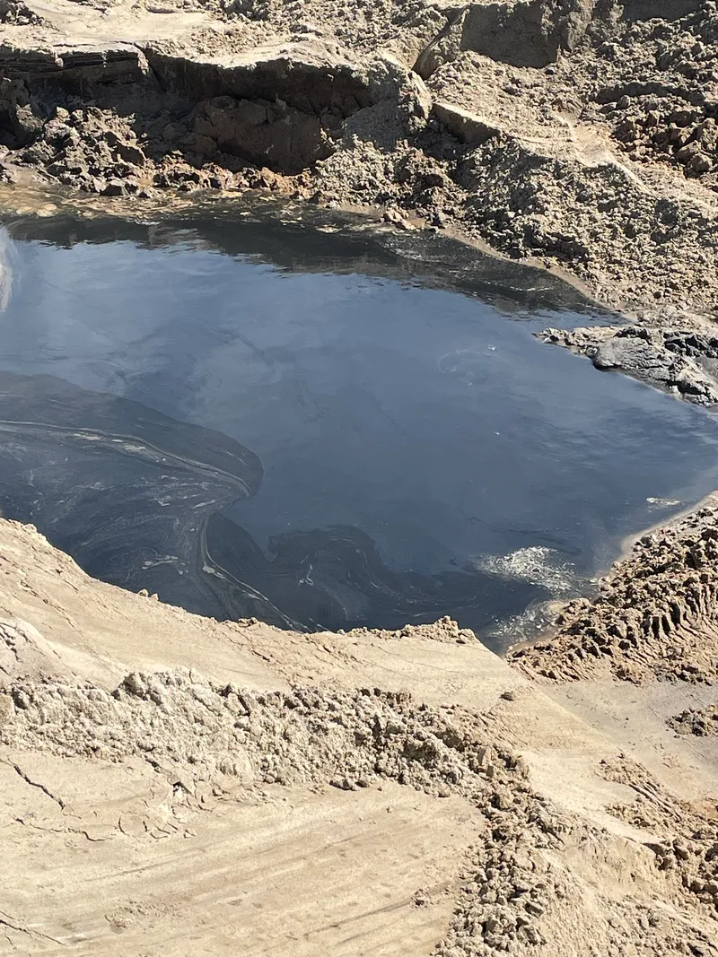 Beach and ocean view at Buxton on Hatteras Island during fall with waves breaking along the shore